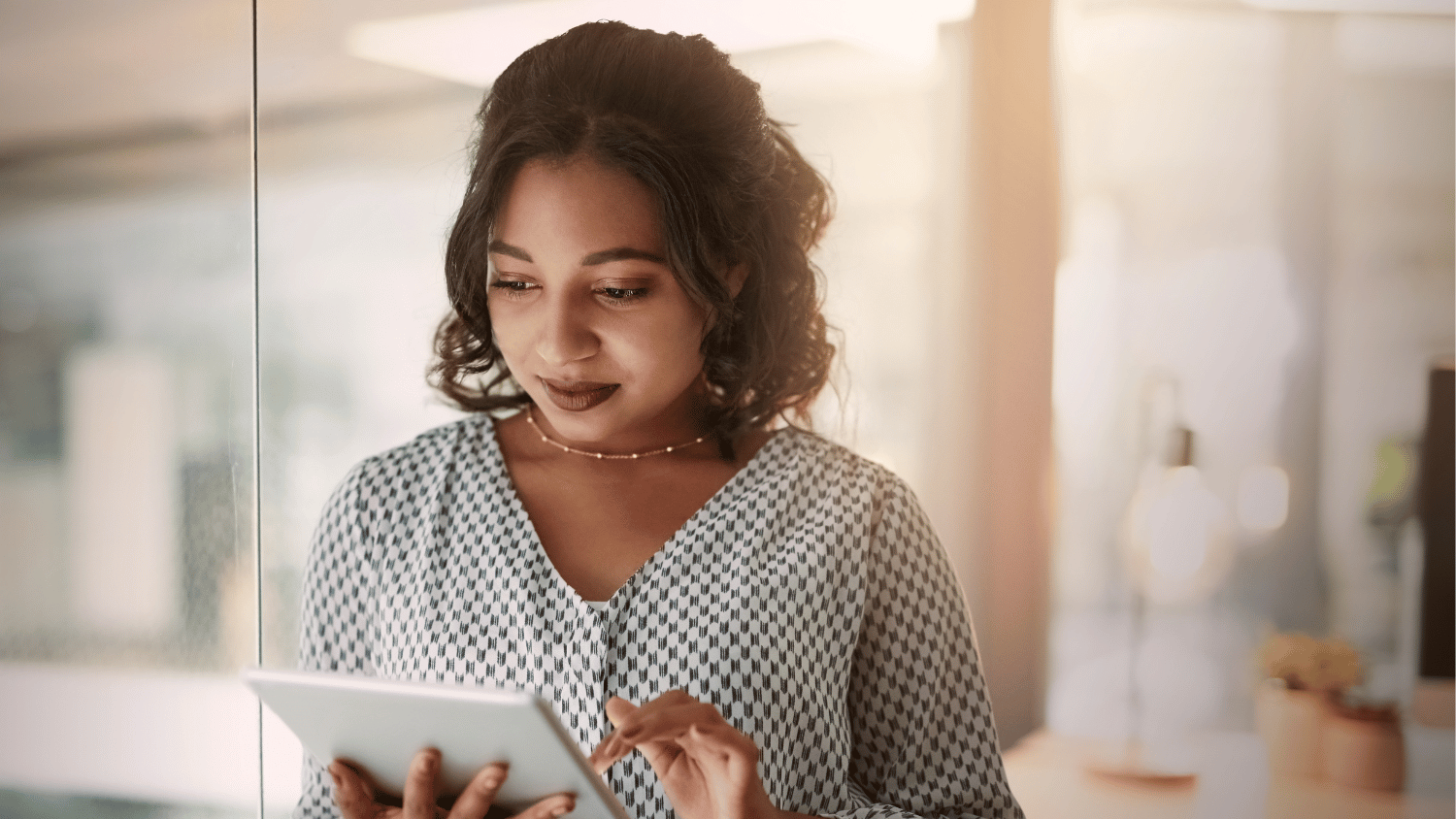 photo of woman with e-tablet.